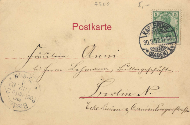 Eine alte Postkarte mit zwei Stempeln, darunter einer aus Baden-Württemberg, und ein Umschlag mit der Aufschrift "Postkarte".