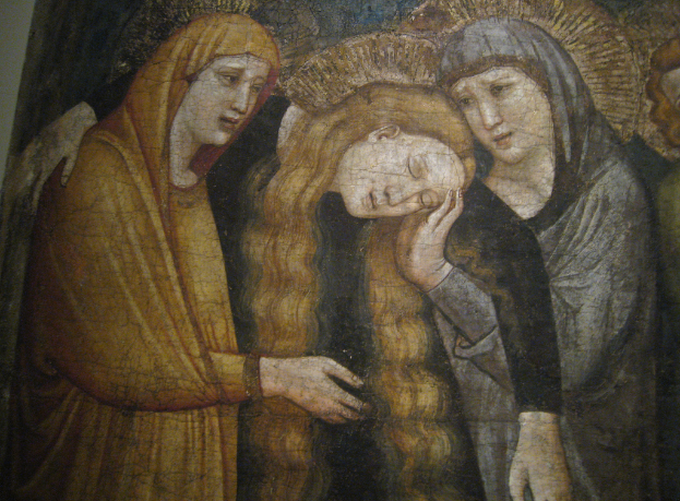 Ein abstraktes Gemälde mit leuchtenden Farben und geometrischen Formen.