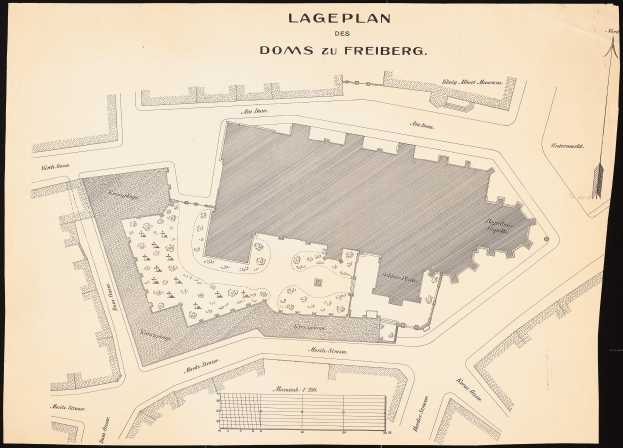 Ein detailliertes altes Stadtplan von Freiburg, Deutschland, auf einem schwarzen Hintergrund, der Gebäude, Straßen und andere Merkmale zeigt.