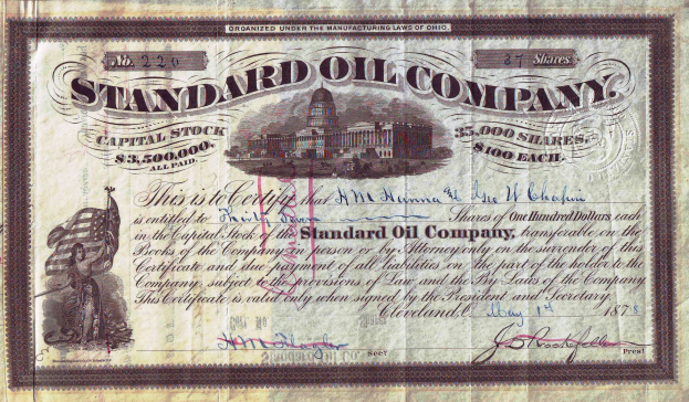 Ein altes Aktienzertifikat der Standard Oil Company, das ein Gebäude und den Text 'Standard Oil Company' zeigt.